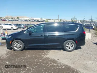 2023 Chrysler Pacifica Touring L with VIN 2C4RC1BG9PR628170, listed as a IAAI auction lot 42515590 with 41,987 mi miles and . Bid and sale history available at DreamBid. Image 14.