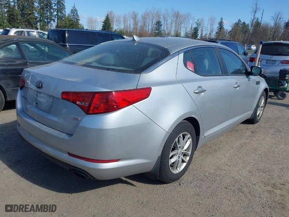 2013 Kia Optima LX with VIN KNAGM4A74D5371383, listed as a IAAI auction lot 41756449 with 133,002 mi miles. Bid and sale history available at carsss.com. Image 4.