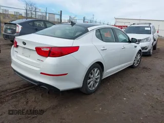 2015 Kia Optima EX with VIN 5XXGN4A73FG438313, listed as a IAAI auction lot 41699954 with 76,584 mi miles. Bid and sale history available at carsss.com. Image 4.