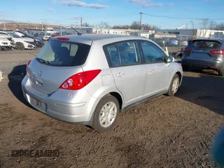 2012 Nissan Versa S with VIN 3N1BC1CP2CK213563, listed as a IAAI auction lot 41339306 with 61,581 mi miles. Bid and sale history available at carsss.com. Image 4.