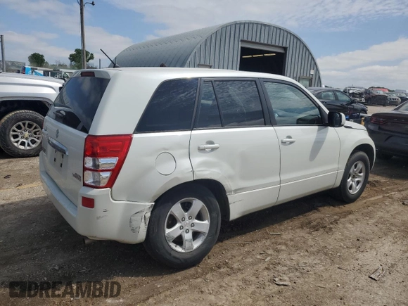2013 Suzuki Grand Vitara Premium z VIN JS3TE0D62D4100310, wystawiony jako Copart lot #54916065 z przebiegiem 116 428 mil mil oraz Szkoda całkowita • Salvage title. Historia ofert i sprzedaży dostępna na DreamBid. Obrazek 3.