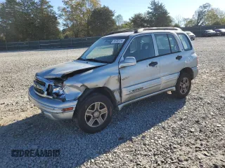 2002 Chevrolet Tracker LT z VIN 2CNBJ634826917460, wystawiony jako Copart lot #76750724 z przebiegiem 170 943 mil mil oraz Czysty tytuł • Clean title. Historia ofert i sprzedaży dostępna na DreamBid. Obrazek 1.