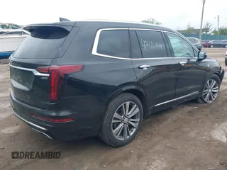 2020 Cadillac XT6 FWD Premium Luxury z VIN 1GYKPCRS6LZ148058, wystawiony jako IAAI lot #42416949 z przebiegiem 79 318 mil mil oraz . Historia ofert i sprzedaży dostępna na DreamBid. Obrazek 4.