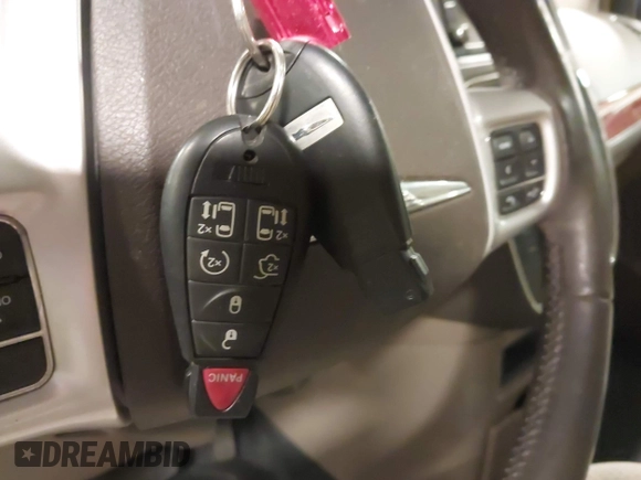 2014 Chrysler Town & Country Touring with VIN 2C4RC1BG2ER422914, listed as a IAAI auction lot 42017742 with 49,856 mi miles and . Bid and sale history available at DreamBid. Image 11.
