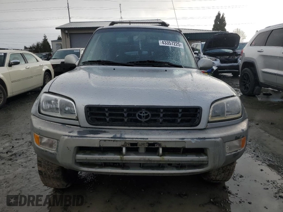 2000 Toyota RAV4 with VIN JT3HP10V7Y7169097, listed as a Copart auction lot 43357225 with 295,509 mi miles and Salvage title. Bid and sale history available at DreamBid. Image 5.