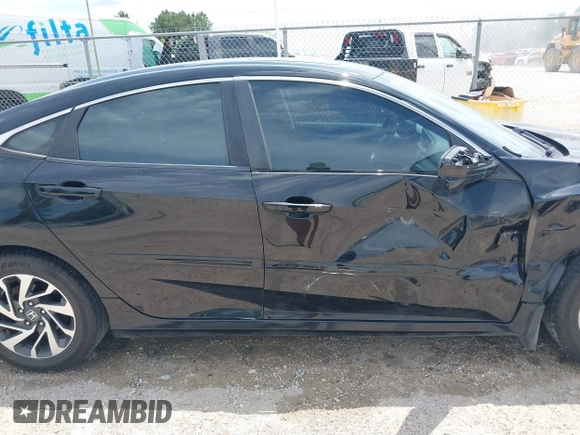 2016 Honda Civic EX with VIN 19XFC2F76GE076101, listed as a IAAI auction lot 42138596 with 135,351 mi miles and . Bid and sale history available at DreamBid. Image 13.
