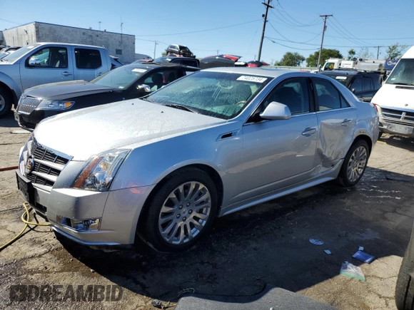 2011 Cadillac CTS Performance with VIN 1G6DJ5ED8B0133179, listed as a Copart auction lot 74025734 with 73,297 mi miles and Salvage Title. Bid and sale history available at DreamBid. Image 1.