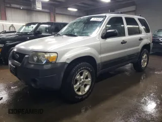 2005 Ford Escape XLT with VIN 1FMYU93145KA20050, listed as a Copart auction lot 76794024 with 98,559 mi miles and Salvage title. Bid and sale history available at DreamBid. Image 1.