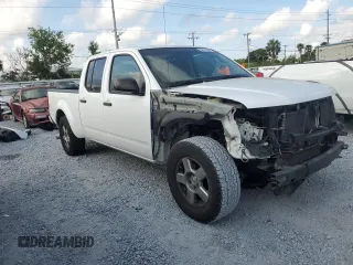 2008 Nissan Frontier SE with VIN 1N6AD09U28C420509, listed as a Copart auction lot 54053585 with 218,970 mi miles and Salvage title. Bid and sale history available at DreamBid. Image 4.