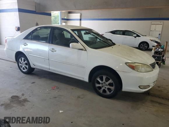 2004 Toyota Camry LE with VIN JTDBE32K940245895, listed as a Copart auction lot 63064585 with 197,467 mi miles and Clean title. Bid and sale history available at DreamBid. Image 4.