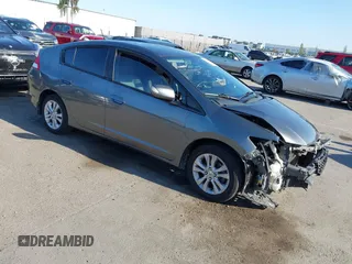 2012 Honda Insight EX z VIN JHMZE2H77CS001370, wystawiony jako IAAI lot #42312077 z przebiegiem 134 249 mil mil oraz . Historia ofert i sprzedaży dostępna na DreamBid. Obrazek 1.