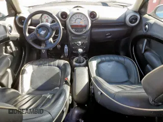 2012 MINI Countryman S with VIN WMWZC3C5XCWM27675, listed as a Copart auction lot 49676205 with 111,499 mi miles and Salvage title. Bid and sale history available at DreamBid. Image 8.