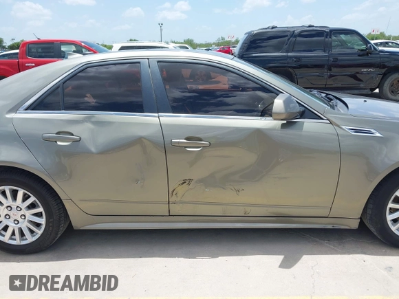 2010 Cadillac CTS Luxury with VIN 1G6DG5EG6A0148433, listed as a IAAI auction lot 42686517 with 106,701 mi miles and . Bid and sale history available at DreamBid. Image 14.