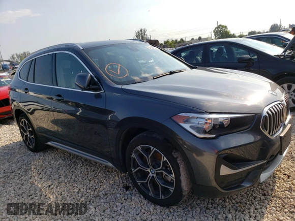 2021 BMW X1 xDrive28i with VIN WBXJG9C09M5T96327, listed as a Copart auction lot 49876493 with 42,572 mi miles and . Bid and sale history available at DreamBid. Image 4.