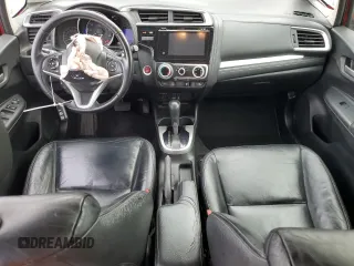 2015 Honda Fit EX-L z VIN 3HGGK5H85FM717100, wystawiony jako Copart lot #57791215 z przebiegiem 202 173 mil mil oraz Czysty tytuł • Clean title. Historia ofert i sprzedaży dostępna na DreamBid. Obrazek 8.