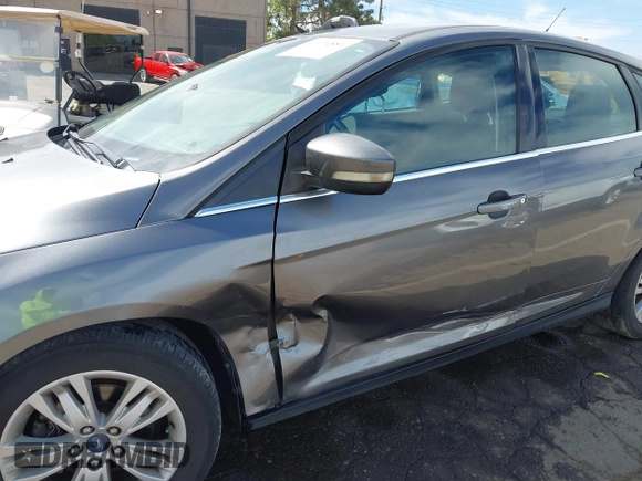 2012 Ford Focus SEL with VIN 1FAHP3M29CL314685, listed as a IAAI auction lot 41974881 with 167,119 mi miles. Bid and sale history available at carsss.com. Image 6.