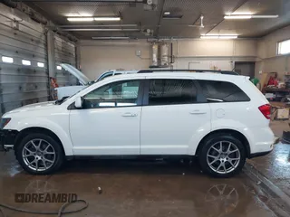 2015 Dodge Journey R/T with VIN 3C4PDDEGXFT574696, listed as a IAAI auction lot 41542460 with 153,044 mi miles and . Bid and sale history available at DreamBid. Image 14.