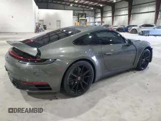 2021 Porsche 911 Carrera with VIN WP0AA2A92MS206733, listed as a Copart auction lot 66537973 with 27,966 mi miles. Bid and sale history available at carsss.com. Image 3.