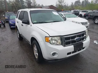 2010 Ford Escape XLS with VIN 1FMCU9C70AKC41802, listed as a IAAI auction lot 42163243 with 106,189 mi miles and . Bid and sale history available at DreamBid. Image 1.