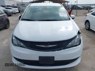 2023 Chrysler Voyager LX z VIN 2C4RC1CG5PR613387, wystawiony jako IAAI lot #42265433 z przebiegiem 55 683 mil mil oraz . Historia ofert i sprzedaży dostępna na DreamBid. Obrazek 12.