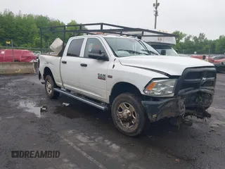 2015 Ram 2500 Tradesman z VIN 3C6UR5CJXFG500994, wystawiony jako IAAI lot #42269164 z przebiegiem 154 666 mil mil oraz . Historia ofert i sprzedaży dostępna na DreamBid. Obrazek 1.