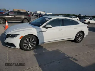 2020 Volkswagen Arteon SE z VIN WVWAR7AN5LE013489, wystawiony jako Copart lot #63134834 z przebiegiem 41 661 mil mil oraz Czysty tytuł • Clean title. Historia ofert i sprzedaży dostępna na DreamBid. Obrazek 1.