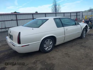 1998 Cadillac Eldorado z VIN 1G6EL12Y2WU603722, wystawiony jako IAAI lot #41879733 z przebiegiem 81 780 mil mil oraz . Historia ofert i sprzedaży dostępna na DreamBid. Obrazek 4.