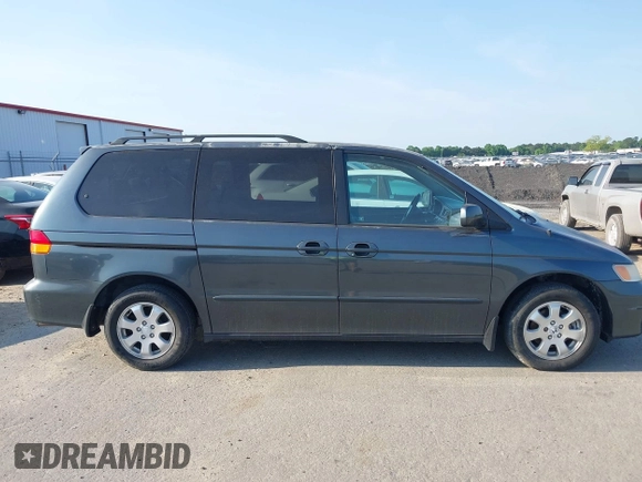 2003 Honda Odyssey EX with VIN 5FNRL18673B112958, listed as a IAAI auction lot 42172282 with 189,521 mi miles and . Bid and sale history available at DreamBid. Image 15.