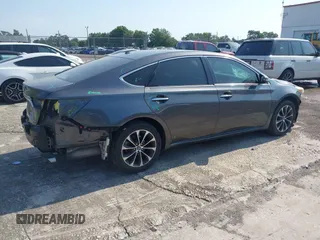 2016 Toyota Avalon Limited z VIN 4T1BK1EB6GU194843, wystawiony jako IAAI lot #42274532 z przebiegiem 100 759 mil mil oraz . Historia ofert i sprzedaży dostępna na DreamBid. Obrazek 4.