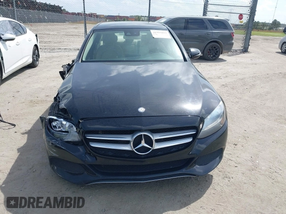 2017 Mercedes-Benz C 300 with VIN 55SWF4JB1HU190340, listed as a IAAI auction lot 41955855 with 158,810 mi miles and . Bid and sale history available at DreamBid. Image 12.