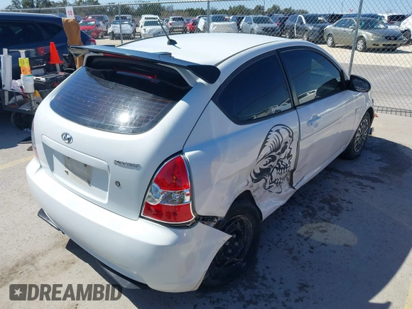 2007 Hyundai Accent GS with VIN KMHCM36C47U050161, listed as a IAAI auction lot 41762927 with 111,684 mi miles. Bid and sale history available at carsss.com. Image 4.