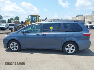 2015 Toyota Sienna LE AAS with VIN 5TDKK3DC1FS642029, listed as a IAAI auction lot 42618738 with 201,344 mi miles and . Bid and sale history available at DreamBid. Image 14.