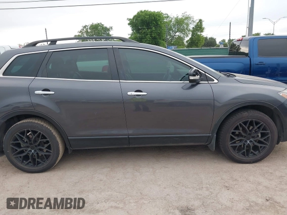 2013 Mazda CX-9 Grand Touring with VIN JM3TB2DA1D0401785, listed as a IAAI auction lot 42034331 with 128,146 mi miles and . Bid and sale history available at DreamBid. Image 13.