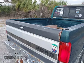 1993 Ford F-150 z VIN 1FTEX15N7PKB65960, wystawiony jako IAAI lot #41306323 z przebiegiem Nie podano mil oraz . Historia ofert i sprzedaży dostępna na DreamBid. Obrazek 16.