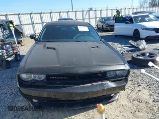 2014 Dodge Challenger R/T Plus z VIN 2C3CDYBT2EH274265, wystawiony jako IAAI lot #41845052 z przebiegiem 120 290 mil mil oraz . Historia ofert i sprzedaży dostępna na DreamBid. Obrazek 12.