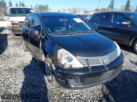 2009 Nissan Versa 1.8 SL with VIN 3N1BC13E59L406937, listed as a IAAI auction lot 41387158 with 149,234 mi miles. Bid and sale history available at carsss.com. Image 1.
