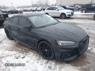 2021 Audi RS 5 Sportback z VIN WUAAWCF50MA904151, wystawiony jako IAAI lot #41172600 z przebiegiem 34 684 mil mil oraz . Historia ofert i sprzedaży dostępna na DreamBid. Obrazek 1.