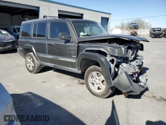 2006 Jeep Commander with VIN 1J8HH48K26C263986, listed as a Copart auction lot 84712294 with 216,923 mi miles and Salvage title. Bid and sale history available at DreamBid. Image 4.