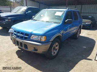2001 Isuzu Rodeo S with VIN 4S2CK58W014315005, listed as a IAAI auction lot 41880618 with 147,384 mi miles. Bid and sale history available at carsss.com. Image 2.