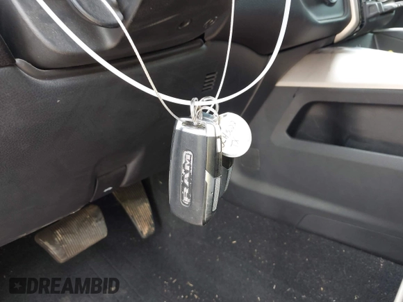 2022 Ram 2500 Laramie with VIN 3C6UR5FJ2NG305658, listed as a IAAI auction lot 42362662 with 50,701 mi miles and . Bid and sale history available at DreamBid. Image 11.