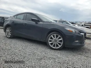 2017 Mazda 3 Touring with VIN 3MZBN1V76HM121191, listed as a Copart auction lot 57478855 with 113,362 mi miles and Salvage title. Bid and sale history available at DreamBid. Image 4.