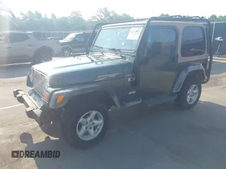 2002 Jeep Wrangler X with VIN 1J4FA39S72P733034, listed as a IAAI auction lot 42659447 with 200,786 mi miles and . Bid and sale history available at DreamBid. Image 17.