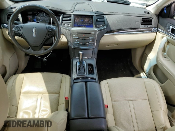 2013 Lincoln MKS with VIN 1LNHL9DK4DG612981, listed as a Copart auction lot 60701895 with 113,354 mi miles and Salvage title. Bid and sale history available at DreamBid. Image 8.