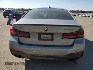 2023 BMW 5 Series M550i xDrive with VIN WBA13BK09PCN61839, listed as a Copart auction lot 76614694 with 16,279 mi miles and Salvage title. Bid and sale history available at DreamBid. Image 6.