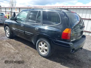 2005 GMC Envoy SLE with VIN 1GKDT13S552212811, listed as a IAAI auction lot 41996953 with 147,896 mi miles. Bid and sale history available at carsss.com. Image 3.