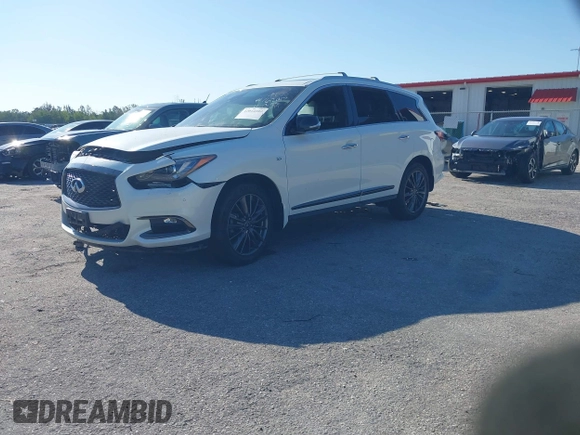 2020 Infiniti QX60 Luxe with VIN 5N1DL0MM3LC526479, listed as a IAAI auction lot 42044109 with 84,010 mi miles and . Bid and sale history available at DreamBid. Image 2.