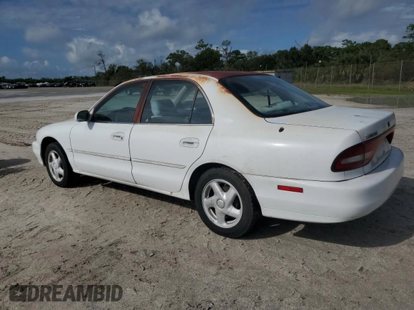 1995 Mitsubishi Galant ES with VIN 4A3AJ56G4SE193873, listed as a Copart auction lot 71312154 with 57,695 mi miles and Clean Title. Bid and sale history available at carsss.com. Image 2.