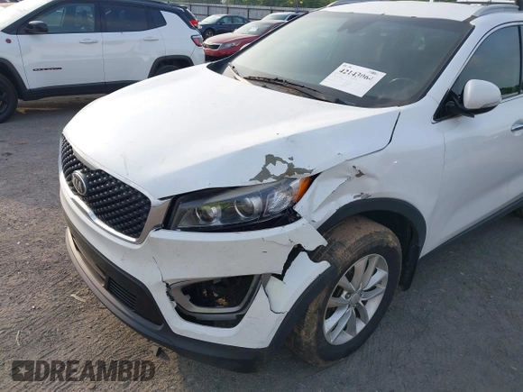 2017 Kia Sorento LX with VIN 5XYPG4A35HG205801, listed as a IAAI auction lot 42143064 with 129,647 mi miles. Bid and sale history available at carsss.com. Image 6.
