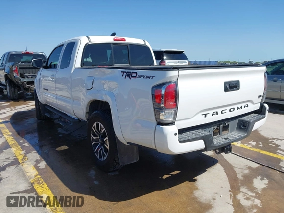 2023 Toyota Tacoma SR z VIN 3TYRZ5CN5PT034397, wystawiony jako IAAI lot #42055222 z przebiegiem 39 144 mil mil oraz . Historia ofert i sprzedaży dostępna na DreamBid. Obrazek 3.