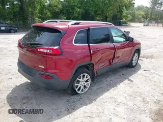 2016 Jeep Cherokee Latitude with VIN 1C4PJLCB8GW320099, listed as a IAAI auction lot 42236076 with 186,000 mi miles and . Bid and sale history available at DreamBid. Image 4.